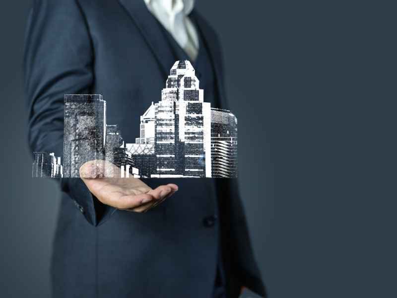 Representación conceptual de un desarrollo inmobiliario en manos de un inversor, simbolizando el poder transformador del capital.